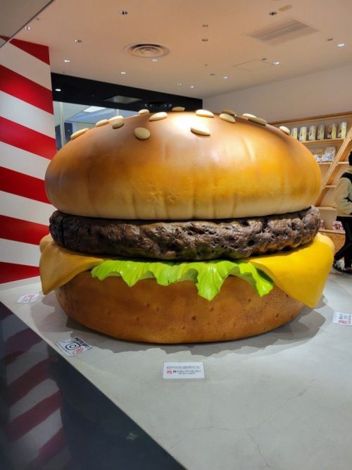 burger sculpture display oversized food installation in mall