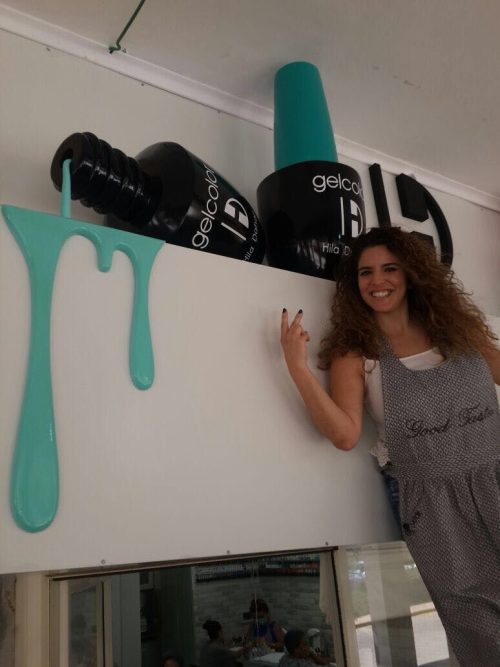 giant gel nail polish sculpture installation for beauty store display and nail salon storefront marketing art