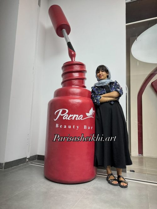 giant nail polish sculpture installation storefront display