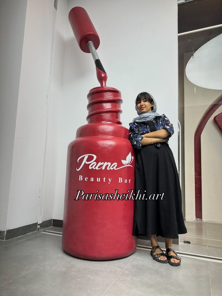 giant nail polish sculpture installation storefront display